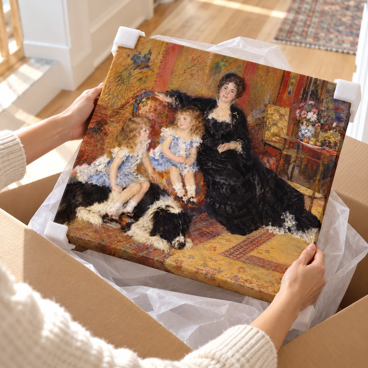 A canvas being lifted out of its shipping box